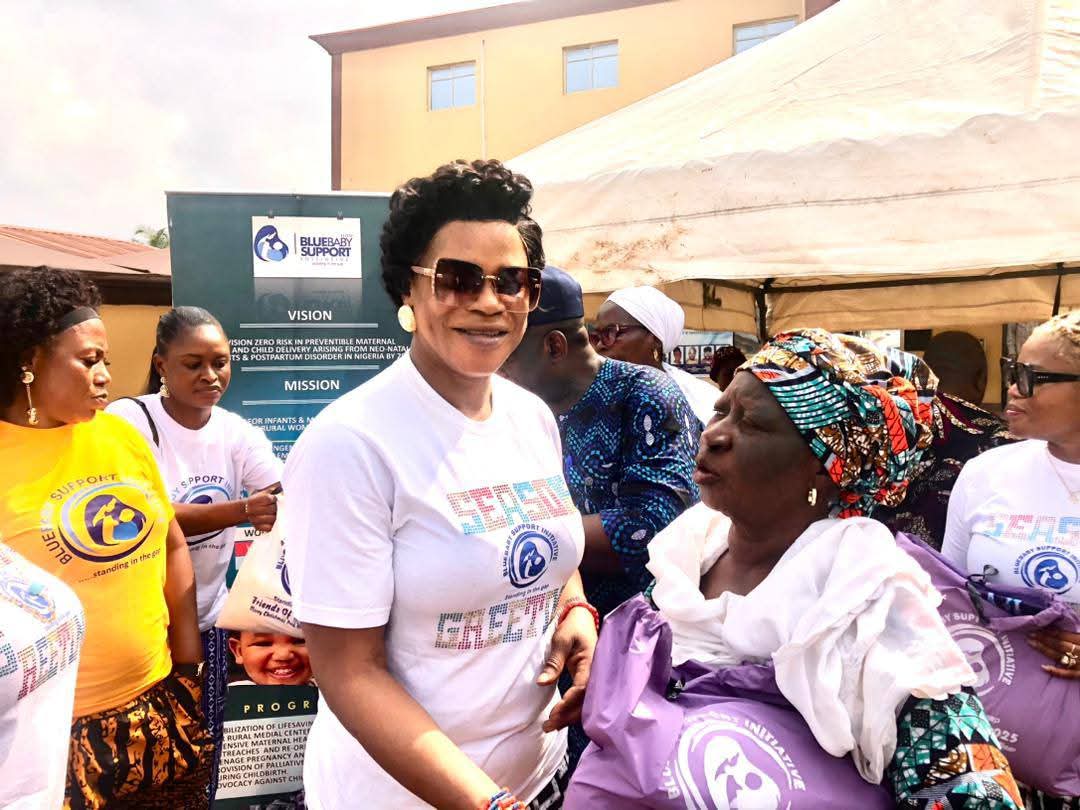 BBSI team member handing out relief packages