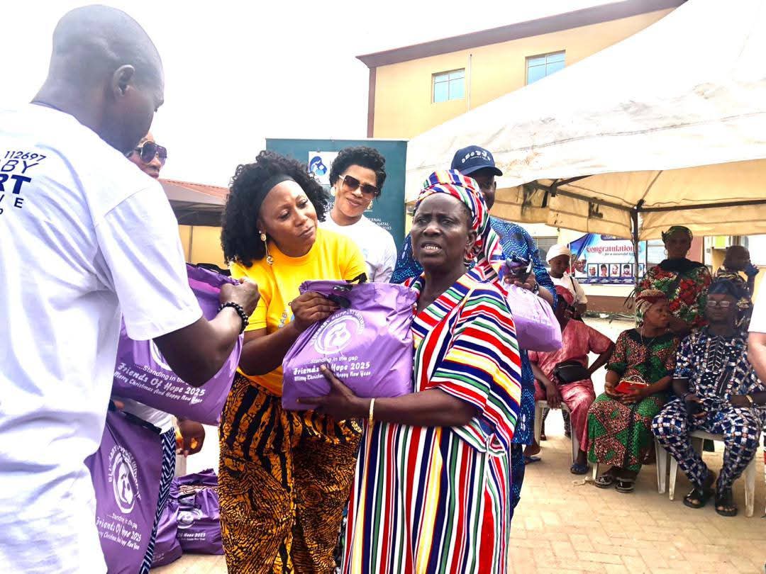 BBSI team member handing out relief packages